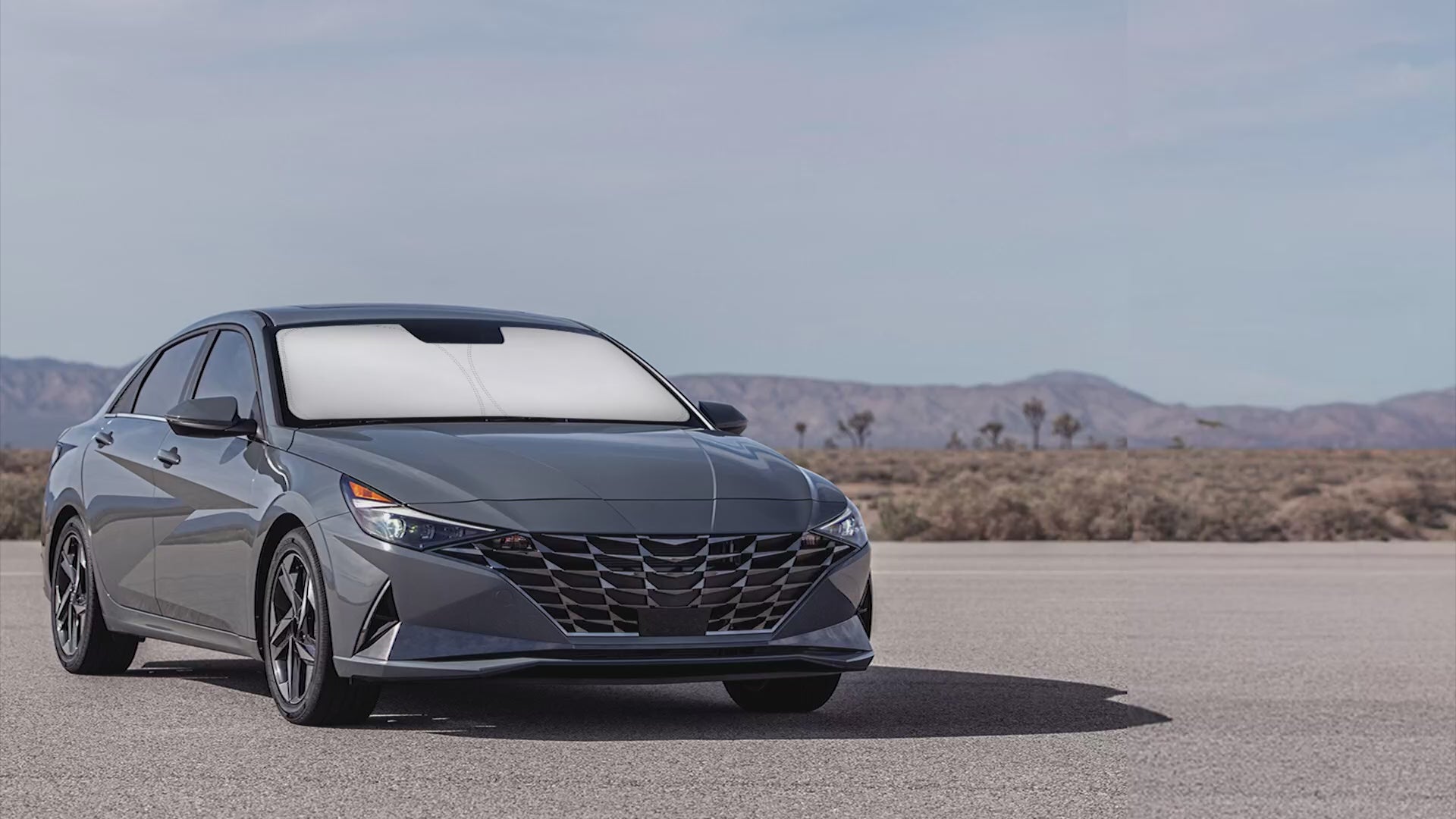 Foldable windshield sunshade for Hyundai Elantra 2021–2026, car sun visor protector, blocks UV rays and heat, keeps car interior cooler, front window sunshade for summer driving, automotive accessory for cars and SUVs