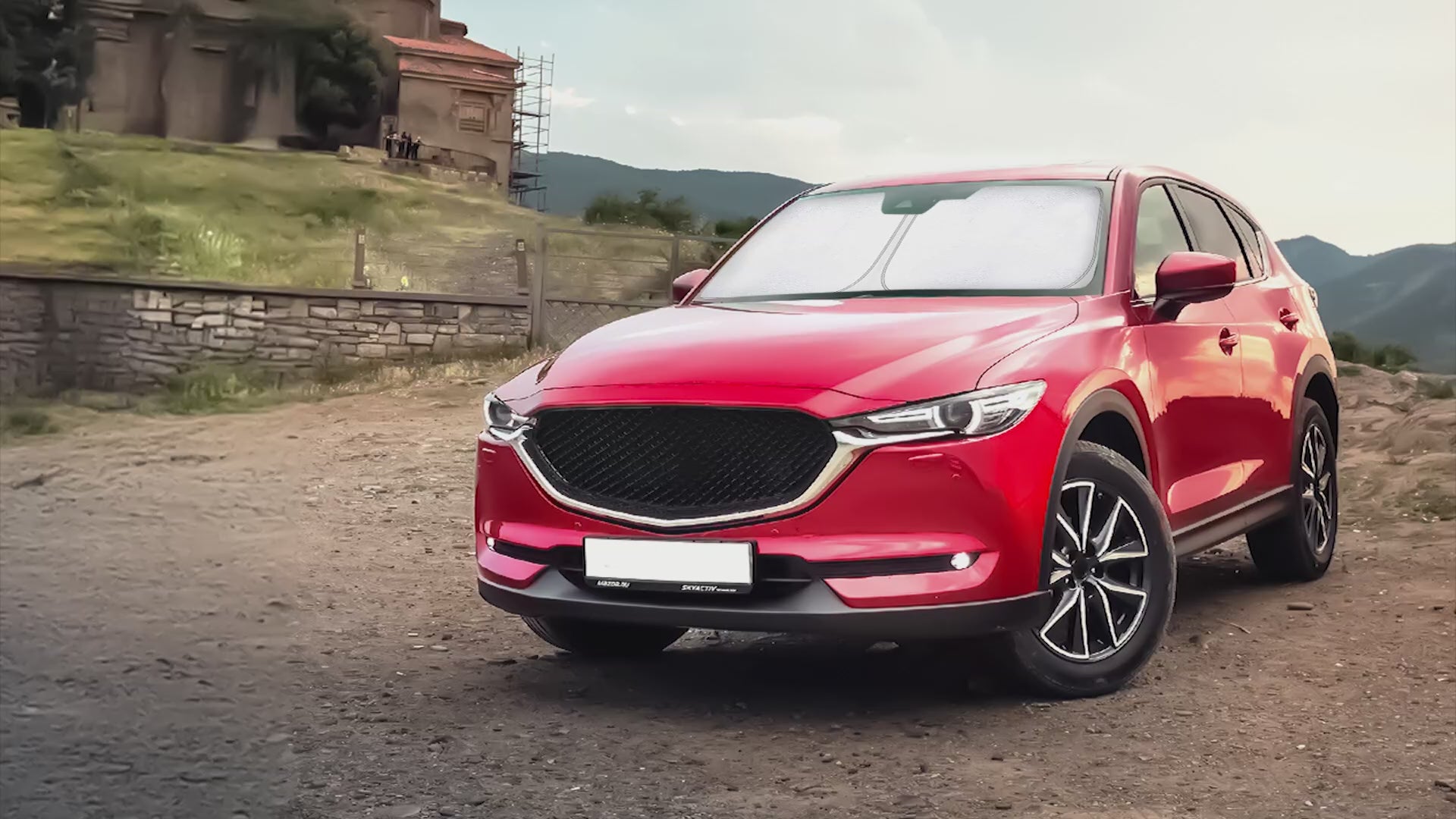 Windshield sun shade for Mazda CX-50 2023-2026, foldable car window sun visor protector, blocks UV rays, keeps car interior cooler, front windshield sunshade for Mazda CX-5, heat reducing sun blocker, automotive sun protection accessory, vehicle sun visor cover, foldable sun shield for SUV, car sunshade for Mazda CX-50