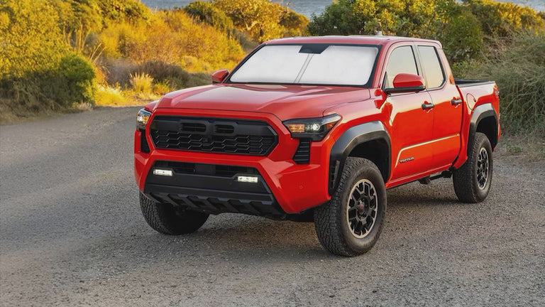 Windshield sun shade for Toyota Tacoma 2016-2026, custom fit 2Dr and 4Dr pickup truck front window sunshade, foldable car sun visor protector, blocks UV rays, keeps truck interior cooler, heat reducing sun blocker, automotive sun protection accessory, vehicle sun visor cover, foldable sun shield for pickup trucks, car sunshade for Toyota Tacoma
